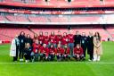 Women in Football, the WPG, the GMA and the all-female grounds team at the Emirates Stadium