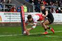 Tommy Makinson scores in the corner