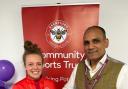 Partners: Emily Donovan, Brentford FC Trust’s health and wellbeing manager, with Tony Hussain, of Home Instead