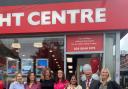 Open for business: the mayor cuts the ribbon at Flight Centre in Ealing Broadway