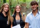 Job done: smiles all round as students pick up their GCSE results