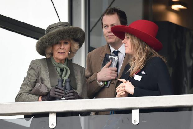 Ealing Times: The Duchess of Cornwall with her son Tom Parker-Bowles (centre) and daughter Laura Lopes (Joe Giddens/PA)