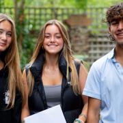 Job done: smiles all round as students pick up their GCSE results