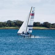 Anna Burnet and John Gimson overcame difficult conditions to break the world record for sailing from Belfast Ballyholme to Port Patrick and back.