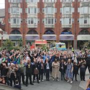 No stopping them: the flash mob perform in sign language at Ealing Broadway