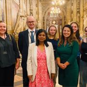 Seat of power: sixth-formers and head Matthew Shoults meet alumna Rupa Huq MP in the Commons