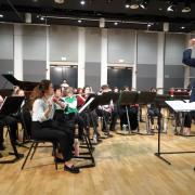 Striking up: Dave Gordon-Shute conducts the new Ealing Wind Orchestra