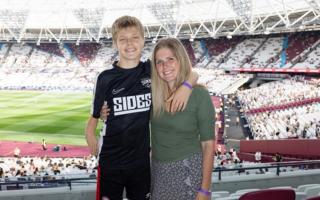 Big day out: Jamie with his mum at the Sidemen football event