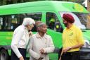 Welcome aboard: Driver Amarjit Kundi greets passengers on one of the familiar ECT green buses