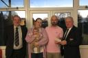 Representatives from the club joined Chris in presenting the cheque to Glenn and Becky and their five month old daughter Ruby