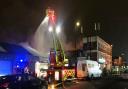 Water tower: a turntable ladder is used to fight the bakery blaze