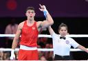 Williams celebrates after being declared winner against Edgardo Coumi of Australia in the Men’s Heavyweight boxing Commonwealth Games semi-final