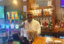 Hands to the pumps: Hitesh Tailor in serving mode at the Morton Arms