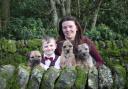 Page, with his mum Claire and their border terriers