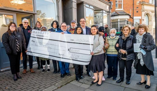 Cheque it out: not only a renovated centre but a cheque for £10,000 for Acton Homeless Concern