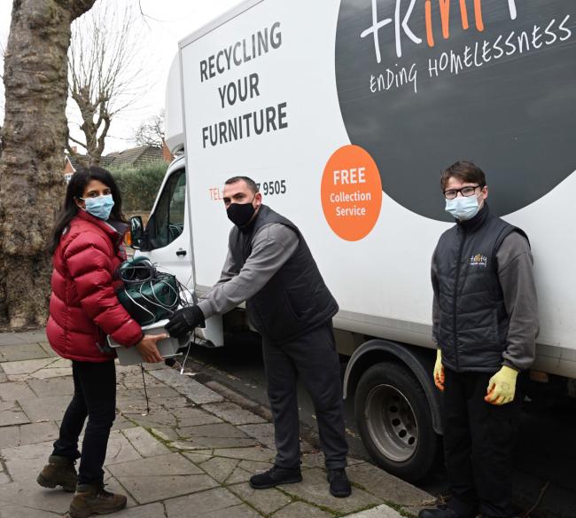 Giving back: Konnie Huq with her box of unwanted electricals