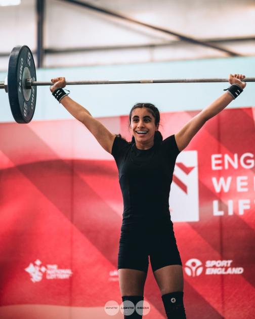 Dhanda defies injury issues to achieve weightlifting medal success