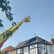 Seat of the fire: some firefighters tackled the blaze from above