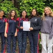 Changing habits: (from left) Simon Piesse (teacher), Bella Henry, facilities manager, Year 10 students  Isabella Pagadala, Eleanor Squire, Maanvi Kapila and Maya Mayfin, Year 12 pupil Alicia Williams and Eliza Lindsay (teacher).