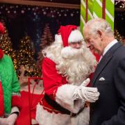 Meeting the Great Man: But Charles seems unfazed by his visit to Ealing Broadway grotto
