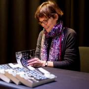 Signed copies: author Maggie Fergusson puts her name to copies of the Mackay Brown biography
