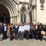 Victory: Hele Mowatt with campaigners outside the High Court