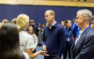 Britan’s first male artistic swimmer meets royalty